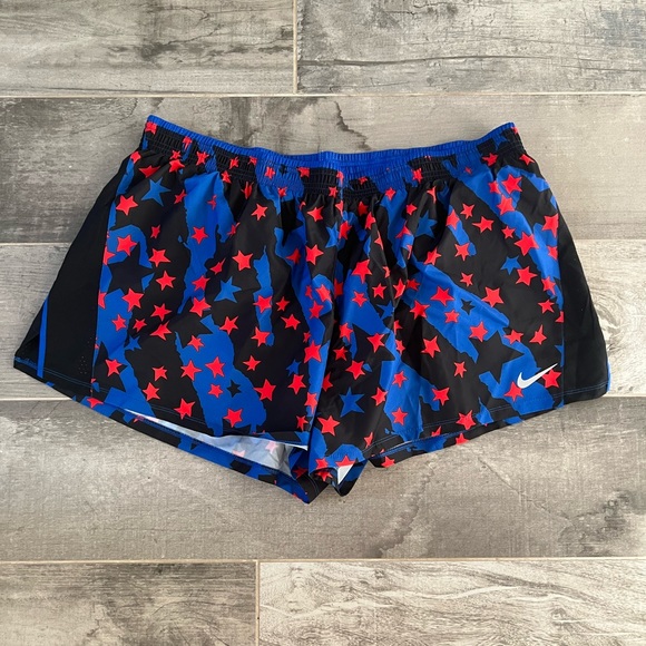 Nike Pants - Nike running shorts. Blue and black with red stars, 2XL.